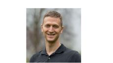 Head shot of Mark Harniss, PhD standing outside.